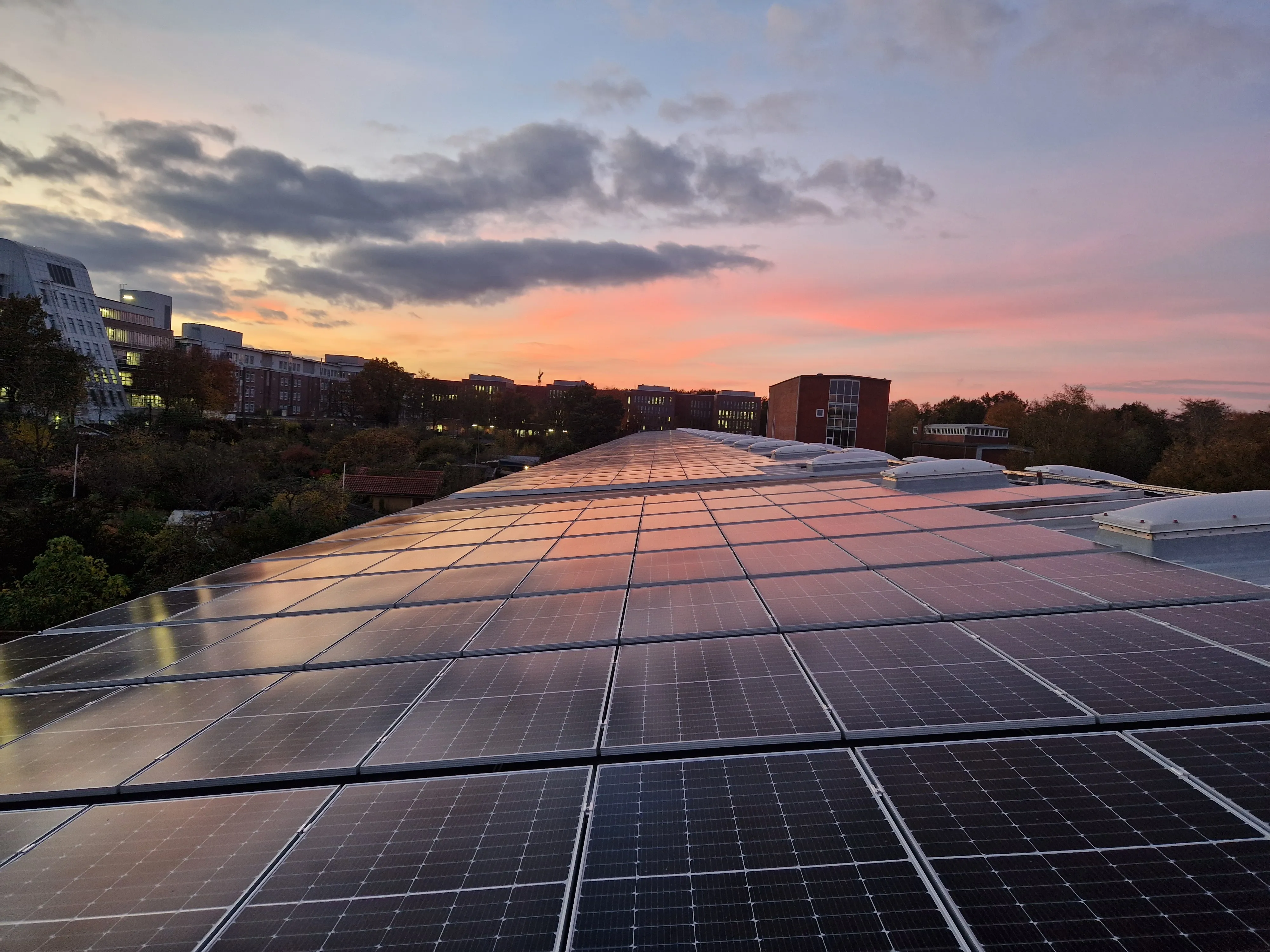 PV-Plant on a rooftop in the sunset